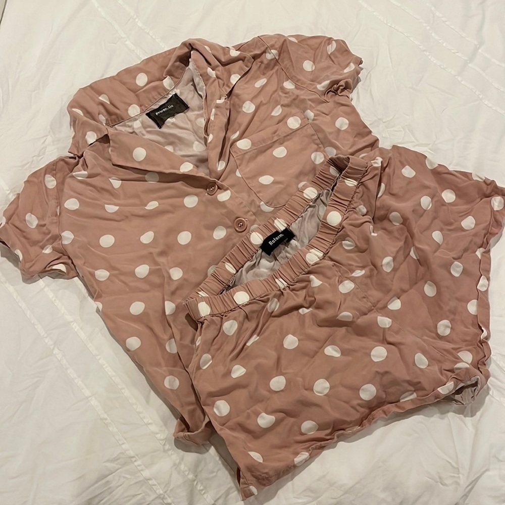 pink and white polka dot reformation pajama set